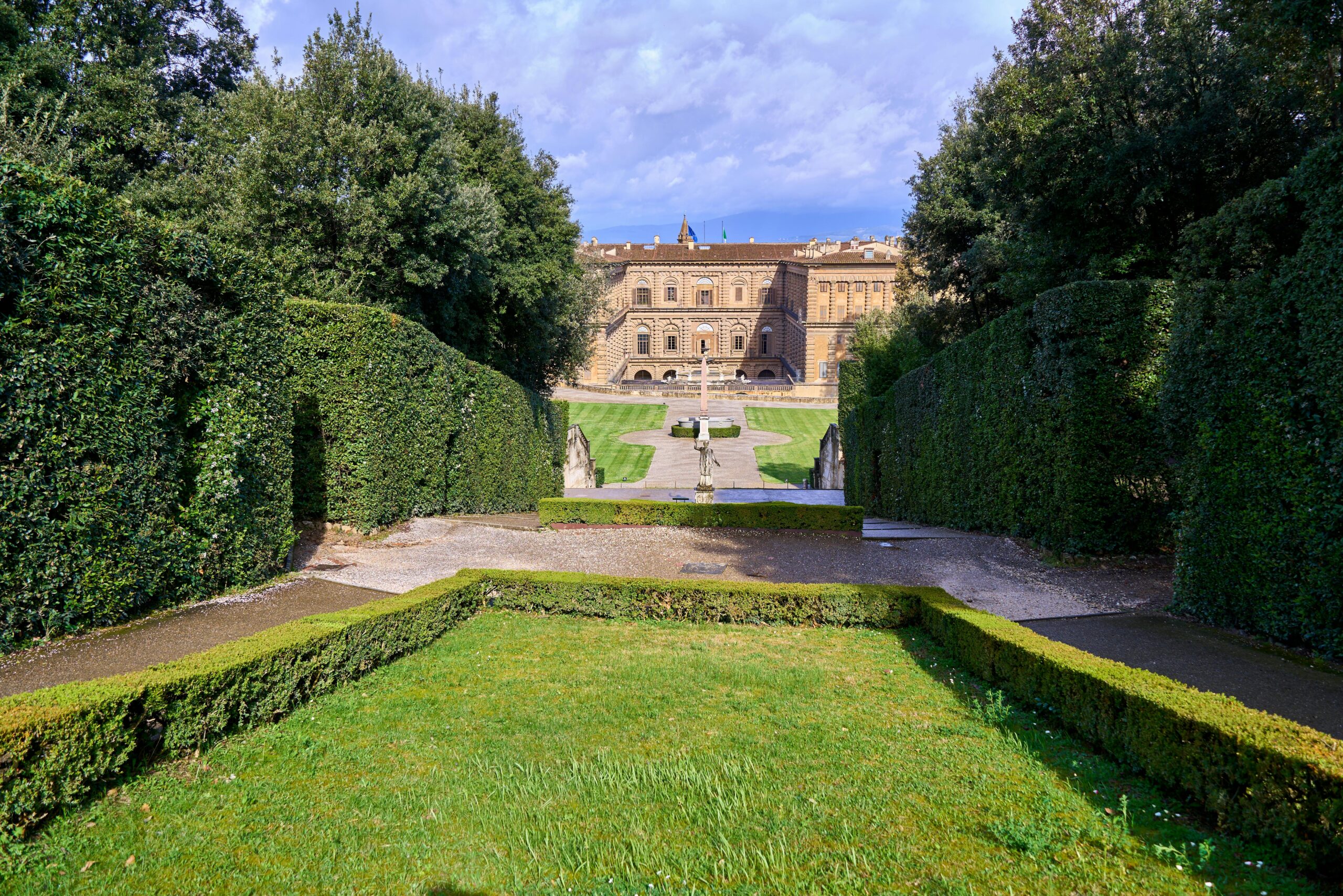 Captivating view of Boboli Gardens with Palace in Florence. Lush greenery and historic architecture.
